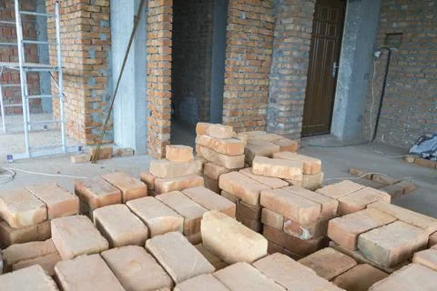 Brickwork of brick, folded in a certain way and fixed with mortar. industrial Stock Photos