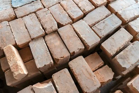 Brickwork of brick, folded in a certain way and fixed with mortar. industrial Stock Photos