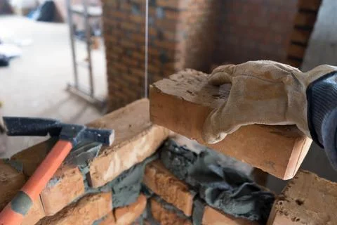 Brickwork of brick, folded in a certain way and fixed with mortar. industrial Stock Photos