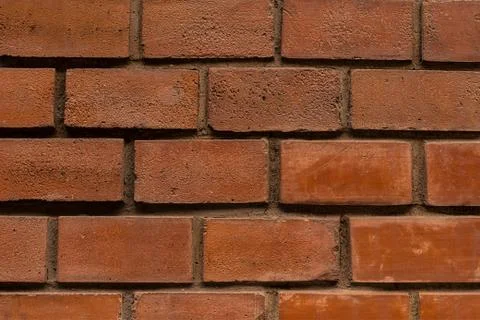 Brickwork brown rectangular block close-up row of symmetrical horizontal vert Stock Photos