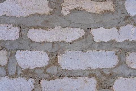 Brickwork on cement. Foto stock