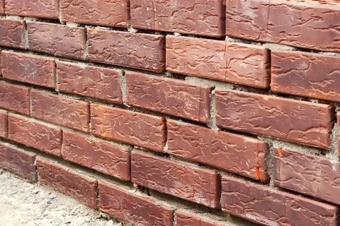 Brickwork close-up. Background of red bricks Stock Photos