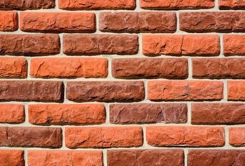 Brickwork in the construction of the house red-brown brick. Stock-Fotos