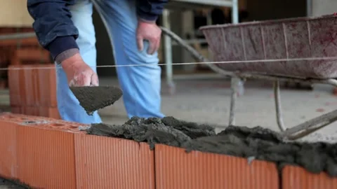 Brickwork at Construction Site: Cement Mortar Application Stock Footage 271583663