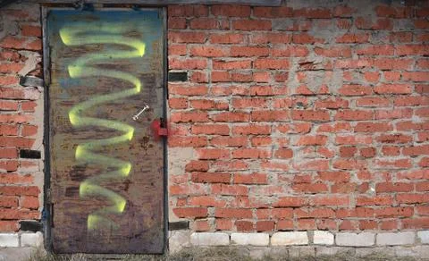 The brickwork of the old wall, uneven bricks and protruding mortar Stock Photos