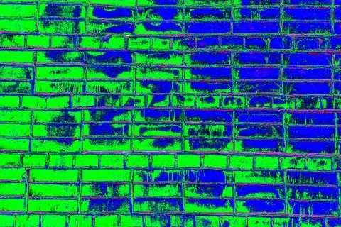 Brickwork painted with red paint, red brick background. Changed color scheme. Stock Photos