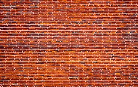 Brickwork pattern creates detailed masonry texture. Brickwork facade shows old Stock Photos