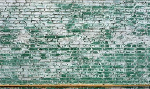 Brickwork pattern with vanished paint layer Stock Photos