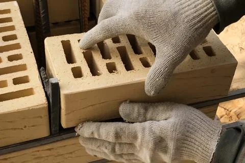 Brickwork of supporting pillar of the building. Brickwork. Stock Photos