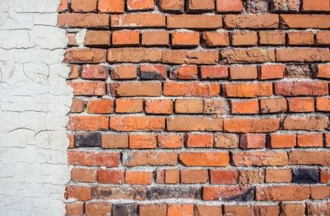Brickwork texture with plaster elements Foto stock