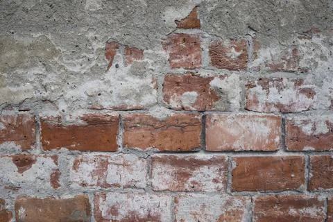 Brickwork under crumbling texture concrete surface Foto stock