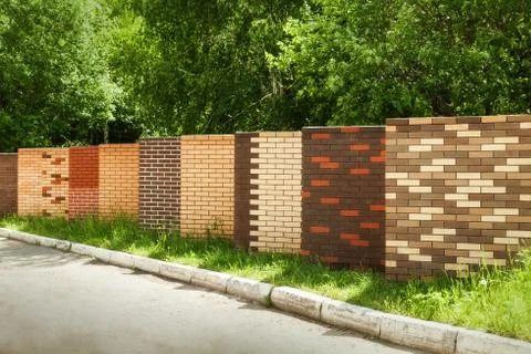 Brickwork variants exposed outdoors. Examples of a bricklaying. Stock Photos