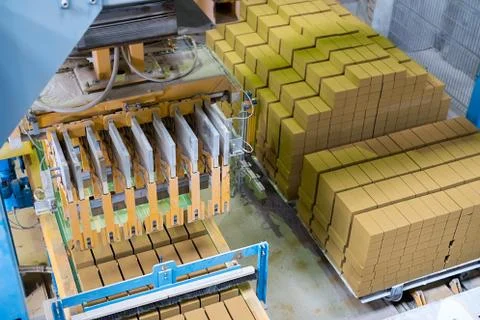 Brickyard. Top view of stacked bricks in workshop Stock Photos