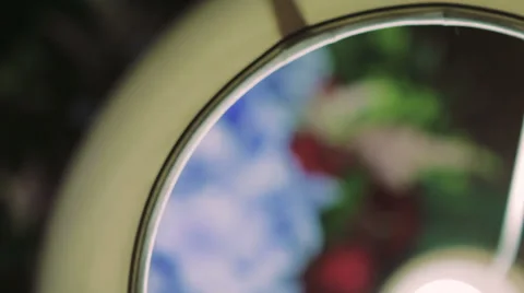 Bridal Bouquet Lying Under a Table Lamp Stock Footage 62771492