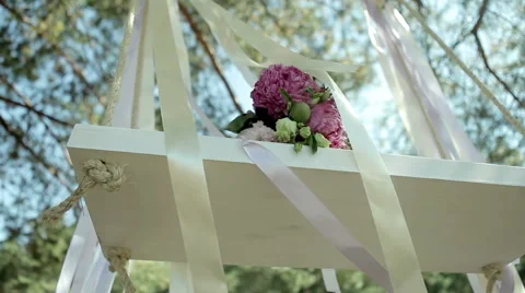 Bridal bouquet on a swing Stock Footage 47793000