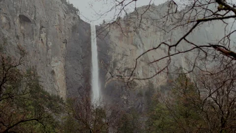 Bridalveil Fall framed by bare branches close up Vídeos de archivo 347986763