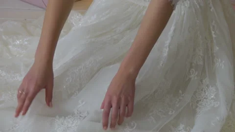 Bride adjusts his dress Stock Footage 86597190