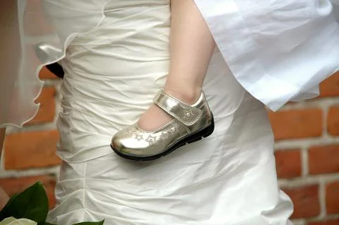 Bride and child Stock Photos