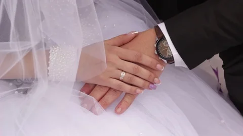 Bride and goom hands Stock Footage 72049404