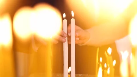 The bride and groom are lighting candles.2 Video stock 315413831