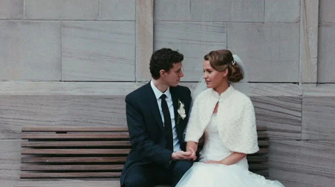 Bride and groom on the bench Stock-Footage 48148553