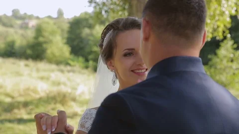 The bride and groom dance the first dance Stock Footage 77209327