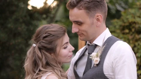 Bride and groom dancing in the open air close up on camera Stock Footage 127933438