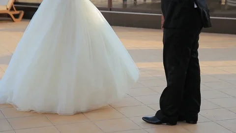 Bride and groom dancing on a summer area Video stock 83345265