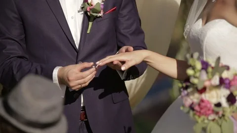 Bride and groom exchanging wedding rings Stock Footage 74058718