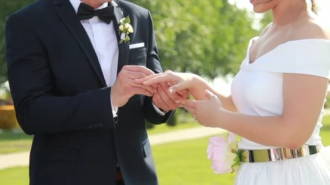 Bride and Groom Exchanging Wedding Rings Stock Footage 97645646