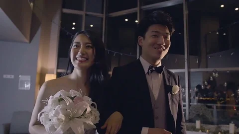 Bride and groom exit wedding reception steady cam shot  Vídeo Stock 77955676