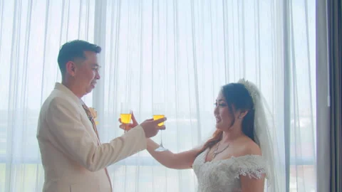 Bride and Groom Feeding Each Other Tea in Traditional Romantic Wedding Ritual Stock Footage 333375265