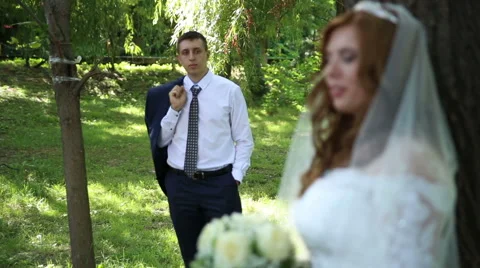 Bride and groom in forest Stock Footage 68543023