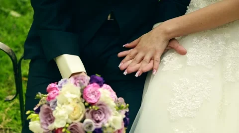 Bride and groom holding hands Stock Footage 64771811