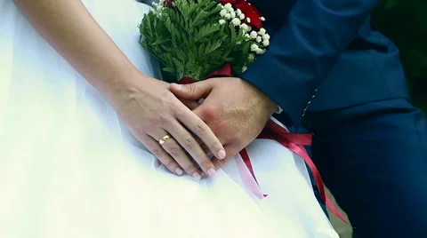 Bride and groom holding hands Stock Footage 64771869
