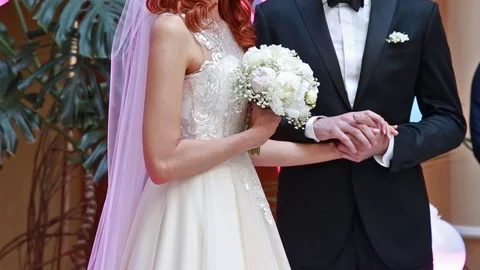 Bride and Groom Holding Hands On A Wedding Ceremony. Video stock 109420357
