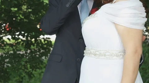 Bride and groom hugging each other on wedding Stock Footage
