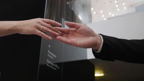Bride and groom join hands with wedding rings in close up Stock-Footage 224693484