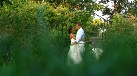 Bride and Groom Kissing Stock Footage