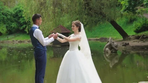 The bride and groom look at each other Stock Footage 73270772