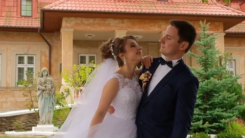 The bride and groom look at each other Stock Footage 75012660