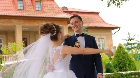The bride and groom look at each other Stock Footage 75013565