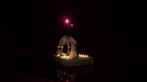 Bride and groom looking firework Stock Footage