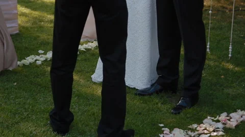 Bride and groom make step on the wedding towel. Stock Footage 46039756