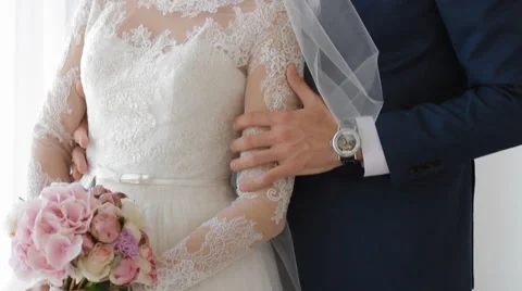 Bride and groom near the window Stock Footage 61182753