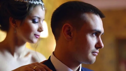 Bride and groom posing in a beautiful interior Video stock 75876785