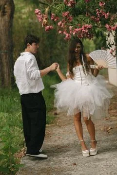 Bride And Groom Posing With Linked Hands Stock Photos