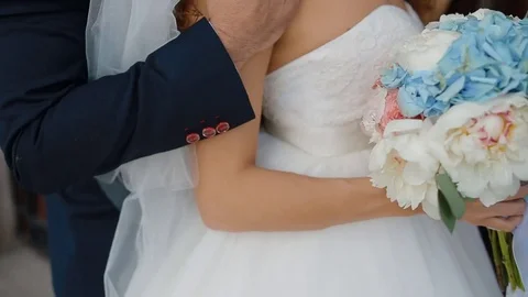 Bride and groom posing outdoors Stock Footage 74455833