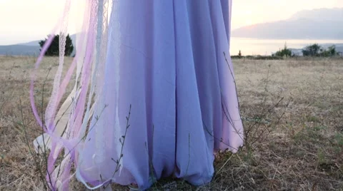 The bride and groom posing on the sunset Stock Footage 58147917