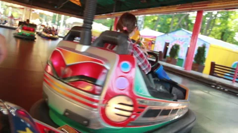 The bride and groom ride on the car carousel on the wedding day Video stock 59182681